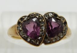 Victorian ring set with two heart cut amethysts surrounded by rose cut diamonds, size I