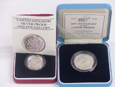 Royal Mint silver proof one pound coin together with a 1995 silver proof two pound example, both