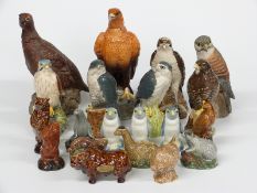 Nineteen Beswick, Royal Doulton, etc whisky novelties in the form of animals, five appear to have