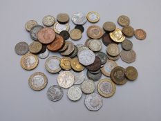A small collection of mostly UK coinage, to include collectable £2, 50p etc