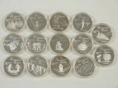 Fourteen 5 dollar 1976 Olympic coins, 24.3g each
