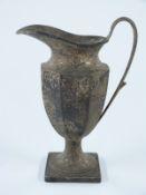 George V hallmarked silver pedestal jug with octagonal body, Birmingham 1922 maker's mark rubbed,