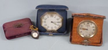 Heart shaped fob watch in case c1920s with rolled gold bow/clasp and two 8 day travelling clocks