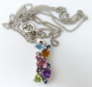 A 9ct white gold pendant set with heart cut topaz, citrine, peridot, amethyst, diamonds on a 9ct