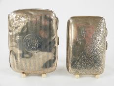Two hallmarked silver cigarette cases, one with engraved ivy leaf decoration, weight of both 101g