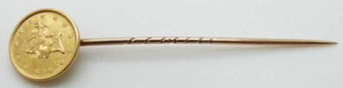 A one dollar United States gold coin mounted on a stick pin, 2.6g