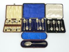 Three cased sets of hallmarked silver spoons including one with tongs and a cased rat tail spoon,
