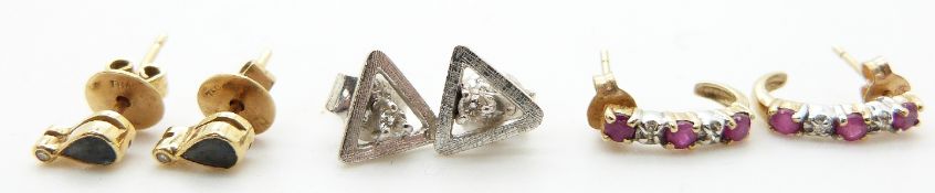 A pair of 18ct gold earrings set with a pear cut sapphire and a diamond to each, a pair of 14k white