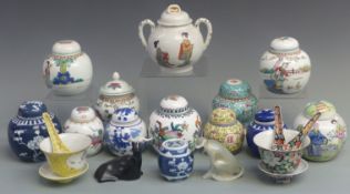 A collection of Chinese ceramics including ginger jars, lidded dishes etc