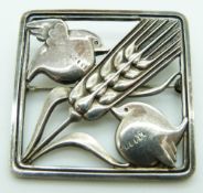 Georg Jensen silver brooch depicting two birds and a wheatear, marked 250, with maker's mark to