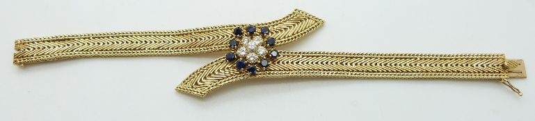 An 18ct gold bracelet set with six diamonds, each approximately 0.2ct in a cluster, surrounded by