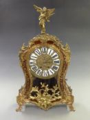 Louis style mantel clock, the brass dial with cabouchon Roman numerals, Brequet style hands, the