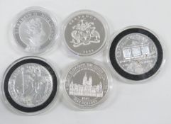2016 silver two pounds Britannia together with four further crown sized silver commemorative coins