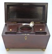 A 19thC rosewood two division tea caddy with brass loop handles, raised on ball feet, H 22cm x W