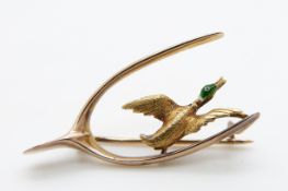 Victorian wishbone brooch with an enamelled duck to the centre