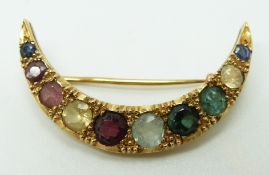Victorian / Edwardian half crescent brooch set with beryl, two tourmalines, aquamarine, garnet,