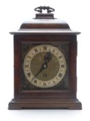 C1930 burr walnut mantel clock with silver Roman chapter ring, masked spandrels and filigree