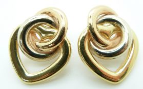 A pair of 18ct gold bi-coloured earrings in loop and heart design, 6.1g
