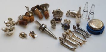 Quantity of white metal, silver plate and other novelty bottle stoppers, peppers etc, many