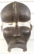 A 19thC / 20thC African tribal mask, height 30cm