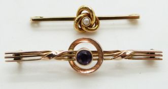 Two Edwardian 9ct gold brooches, one a knot set with a pearl and the other set with an amethyst, 4.