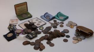 A collection of coins including some silver content