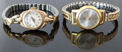 Two ladies wristwatches one Bucherer with gold hands and baton markers, silver face and gold