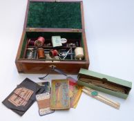 An inlaid marquetry workbox with contents inc vintage bone cotton holder, scissors, needles,
