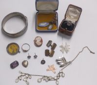 A collection of silver jewellery including a bangle, marcasite ring in vintage box, brooch,