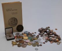 A large quantity of US coins and tokens and a book on US trade tokens