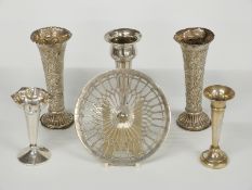 Five various Victorian and later hallmarked silver trumpet vases including a pair of embossed