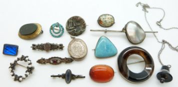 A collection of jewellery including Victorian silver, other brooches including agate set etc