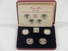 Royal Mint 1984-1987 £1 silver proof collection comprising four one pound coins, in original case