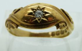 Edwardian 18ct gold ring set with a diamond in a star setting, Birmingham 1904