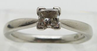 A platinum ring set with a princess cut diamond of approximately 0.35ct, size J