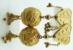 A pair of c1890 yellow metal Indian earrings, with original receipt