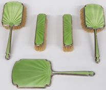 Art Deco green guilloché enamel hallmarked silver dressing table set comprising hand mirror and four