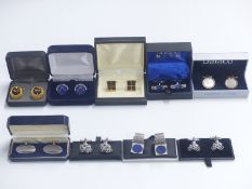 A collection of cufflinks including lapis lazuli, mother of pearl, cycling cufflinks etc.
