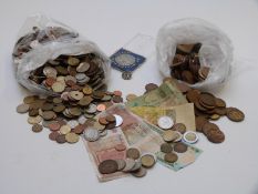 A large collection of overseas largely holiday change coinage with a few banknotes, together with