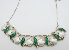 Norwegian silver necklace in a floral and foliate design set with white and green enamel