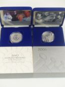 Two Royal Mint silver proof crowns comprising 2006 Queen's 80th birthday and 2007 Diamond Wedding,