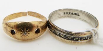 An 18ct gold ring (1.6g) and a 9ct gold and silver ring.