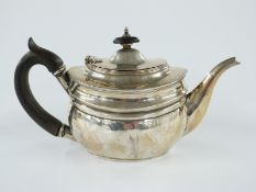 George V hallmarked silver bachelor's teapot, London 1911 maker C S Harris & Sons Ltd, length 21.