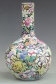 A 19th / 20thC Chinese famille noir bulbous vase with seal mark to base, height 34cm