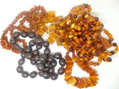 Two pressed amber bracelets, two amber necklaces and another necklace