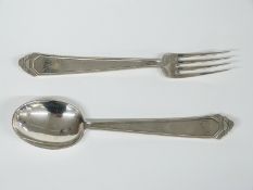 Possibly Belgian Art Deco white metal spoon and fork with hammered design to handle, marked with