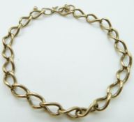 A 9ct gold curb link bracelet, 10.5g