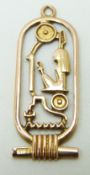 A yellow metal Egyptian pendant, 2.3g