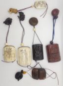 Six various bone and carved wood inro each with netsukes, some signed