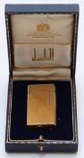Dunhill 70 plated cigarette lighter with engine turned decoration, in original fitted case, 7cm